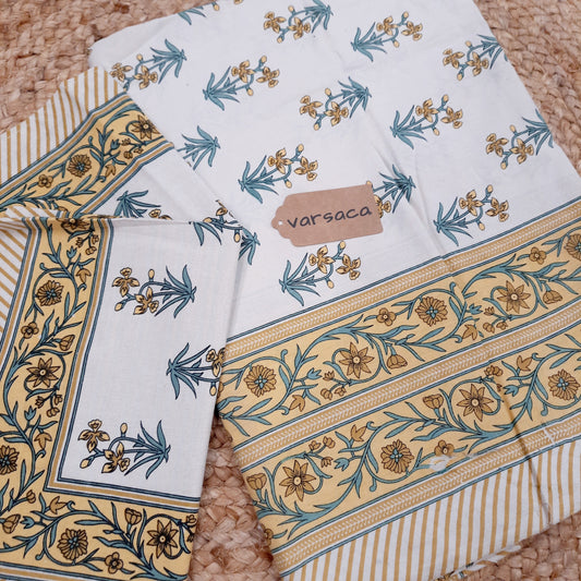 Yellow and White Hand Block Print King Size Bedsheet With Yellow Floral Motifs , Green Leaves And Yellow Striped Border