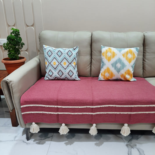 Magenta jute cotton sofa cover with lace and tassels