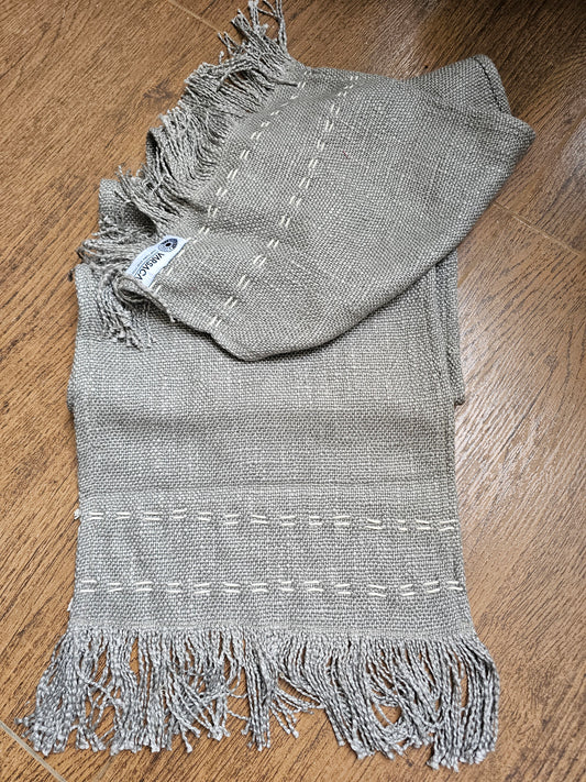 grey cotton table runner with tassels