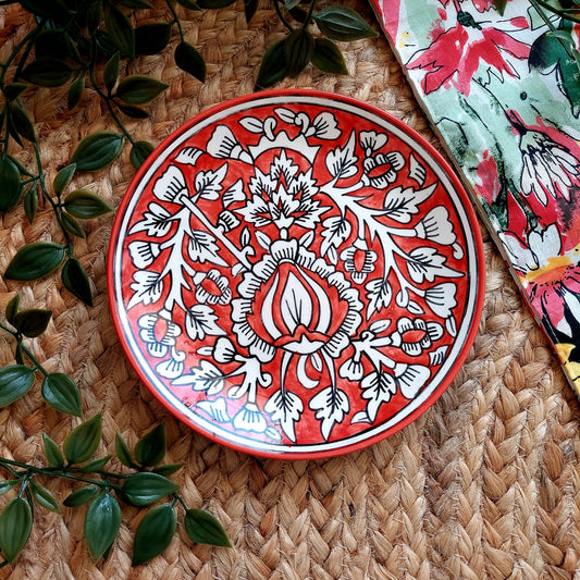 Hand-Painted Red Ceramic Wall Plate with Intricate Motifs