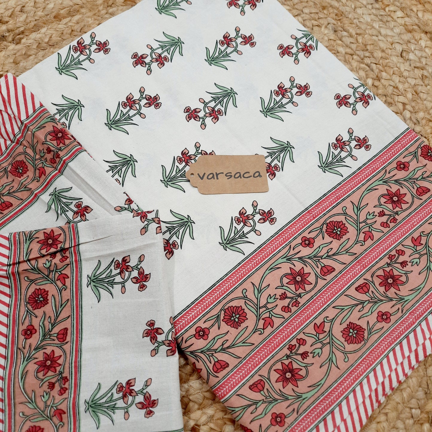 Peach and White Hand Block Print King Size Bedsheet With Red Floral Motifs , Green Leaves And Peach Striped Border