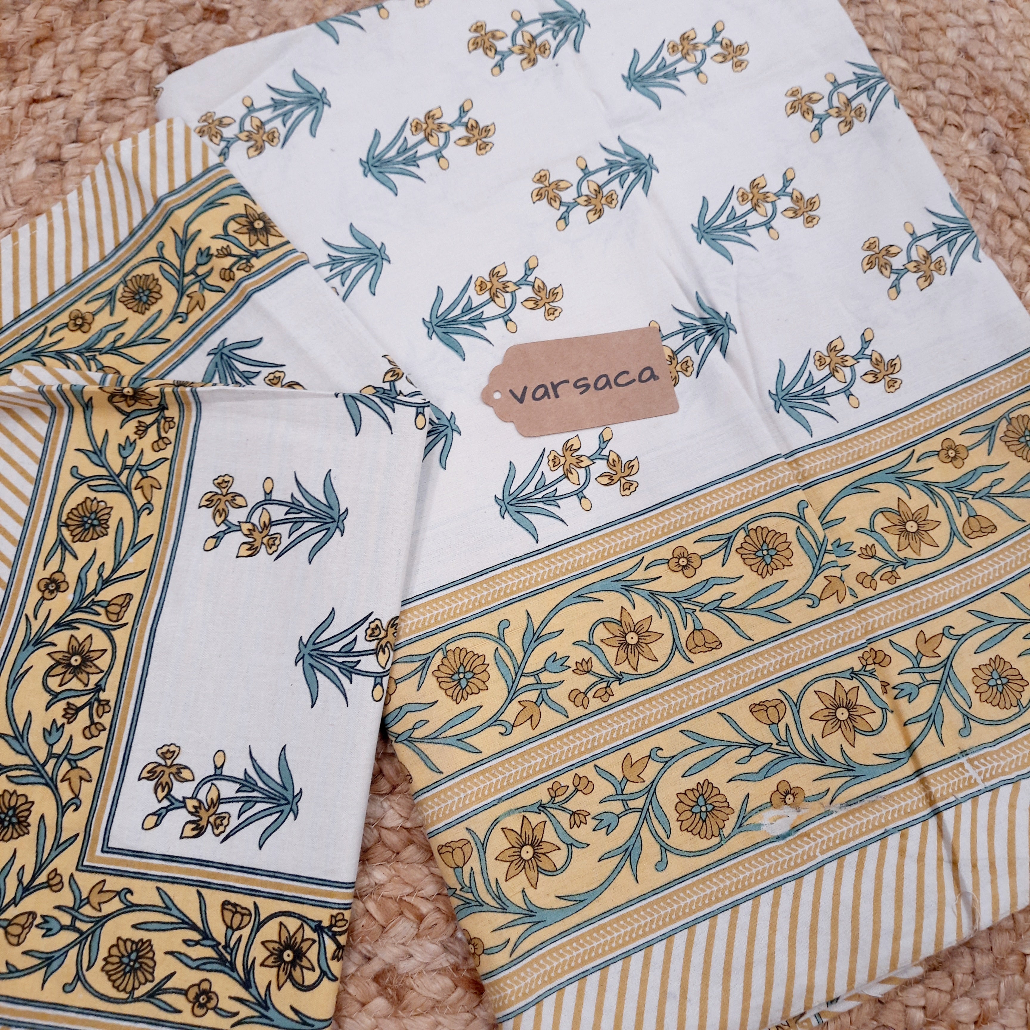 Yellow and White Hand Block Print King Size Bedsheet With Yellow Floral Motifs , Green Leaves And Yellow Striped Border