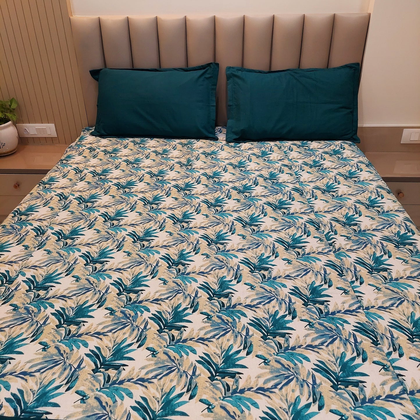 Peacock Blue Leaves Cotton King Size Bedsheet – Elegant Design with Plain Border