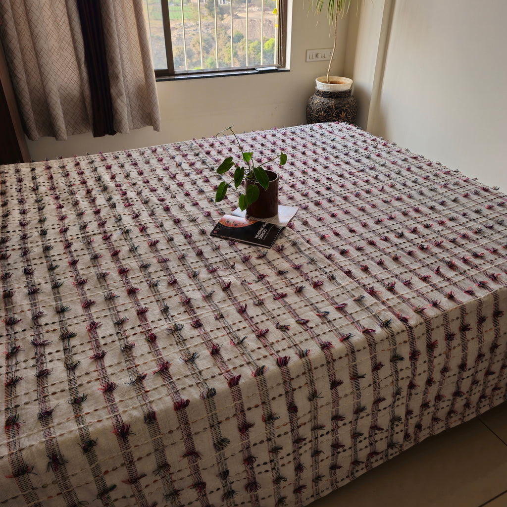 White Handloom Slub Cotton Bed Cover – Multicolour Thread Work Elegance