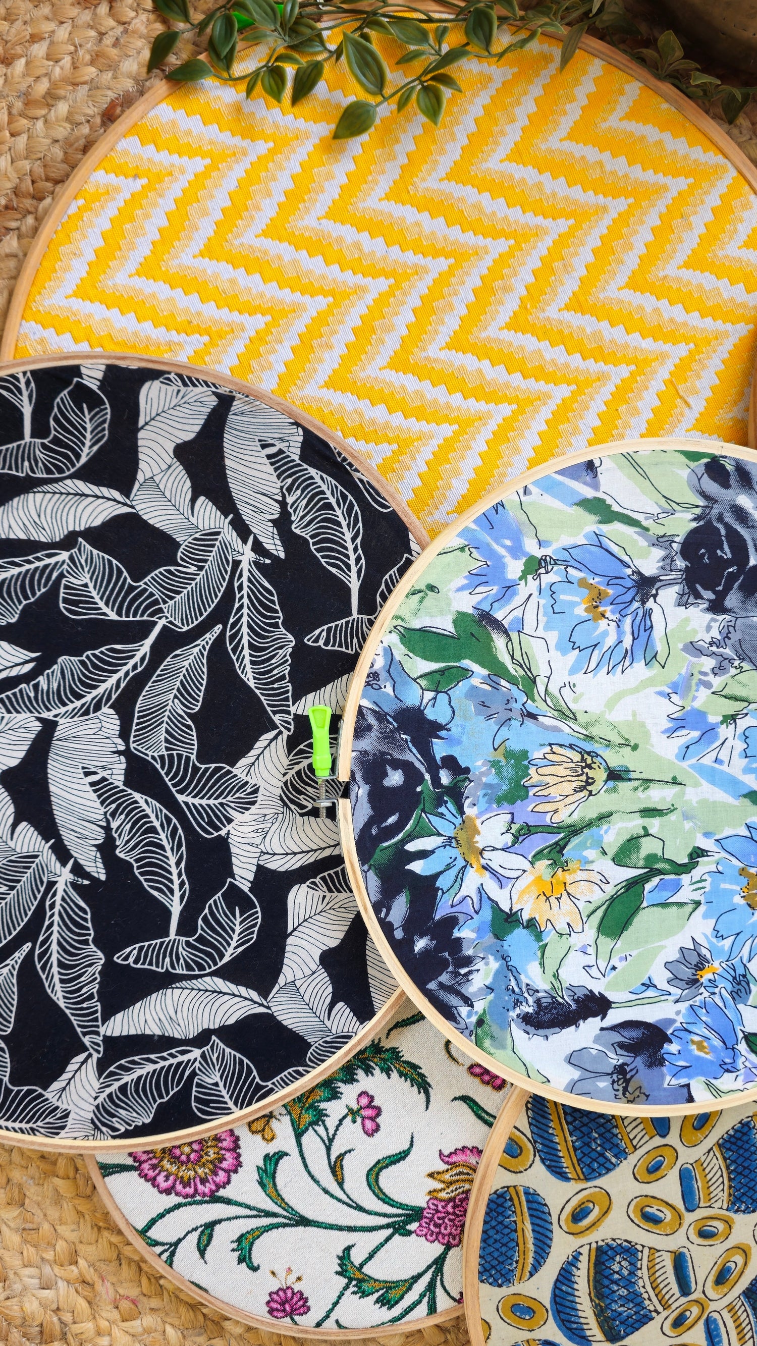 Set of colorful coasters with different patterns on a textured surface.