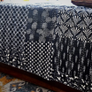 Black Kantha Work Bedcover with white motifs