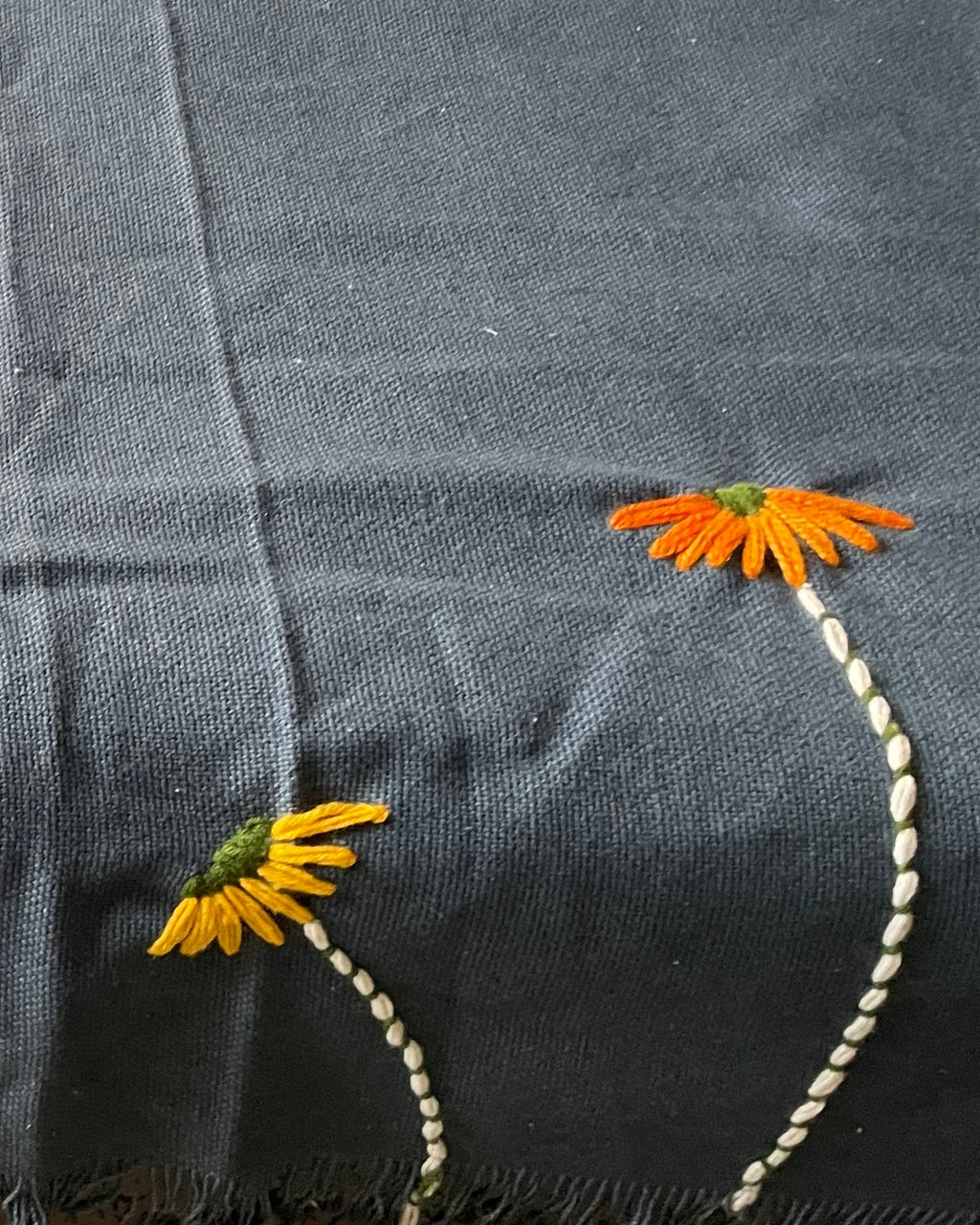 Close up pic of embroidered cushion cover 