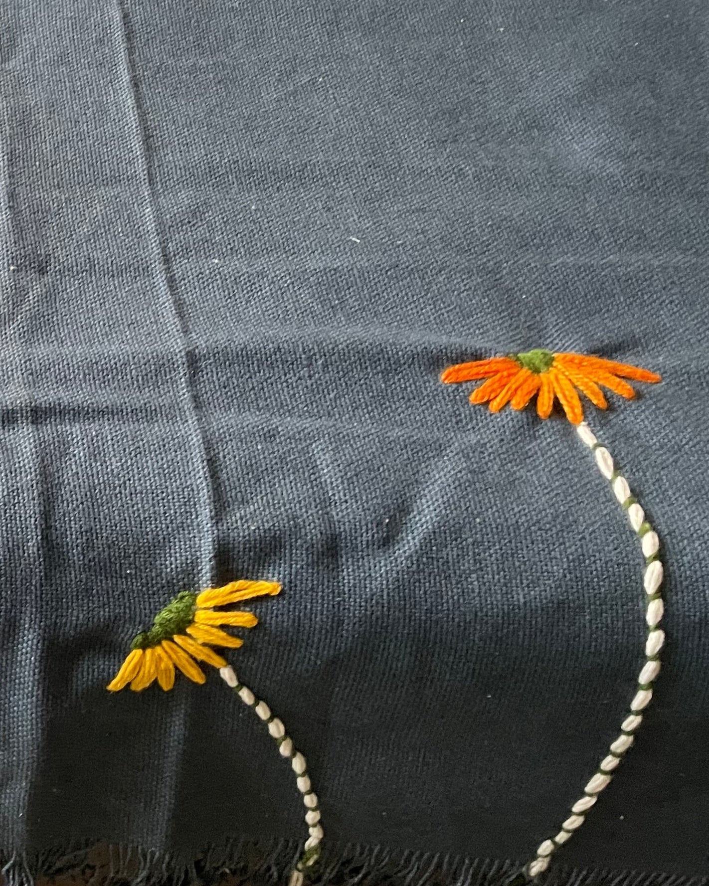 Close up pic of embroidered cushion cover 