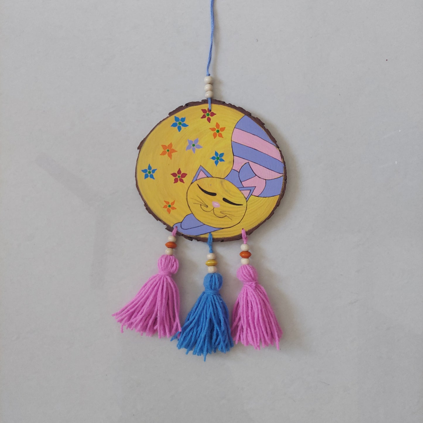 Handpainted Wooden Wall Hanging With Tassels