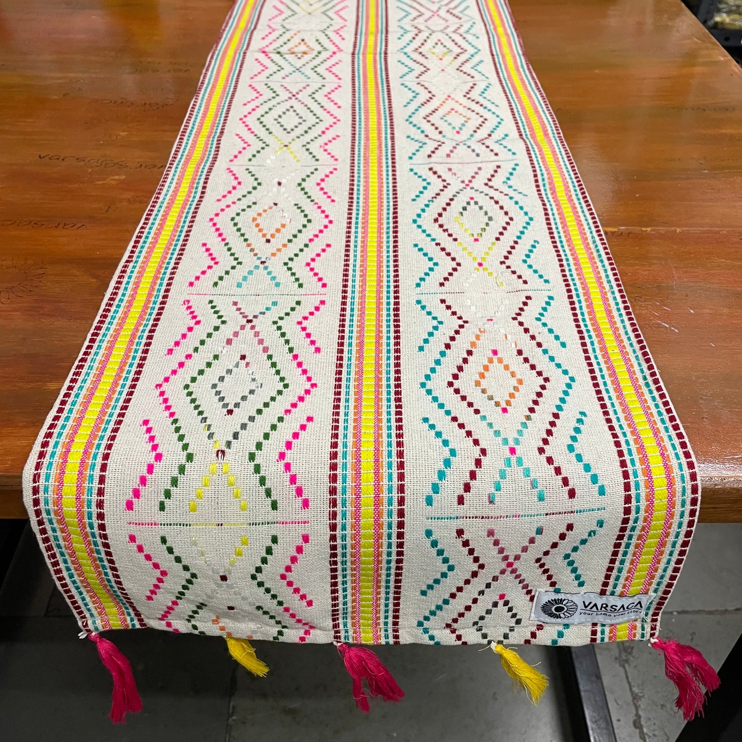 Handwoven Beige Table Runner With Multicolour Thread Work And Tassels