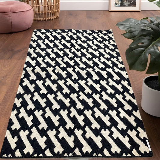 5x3 Black and White Geometric Woolen Rug – Modern & Cozy Floor Carpet