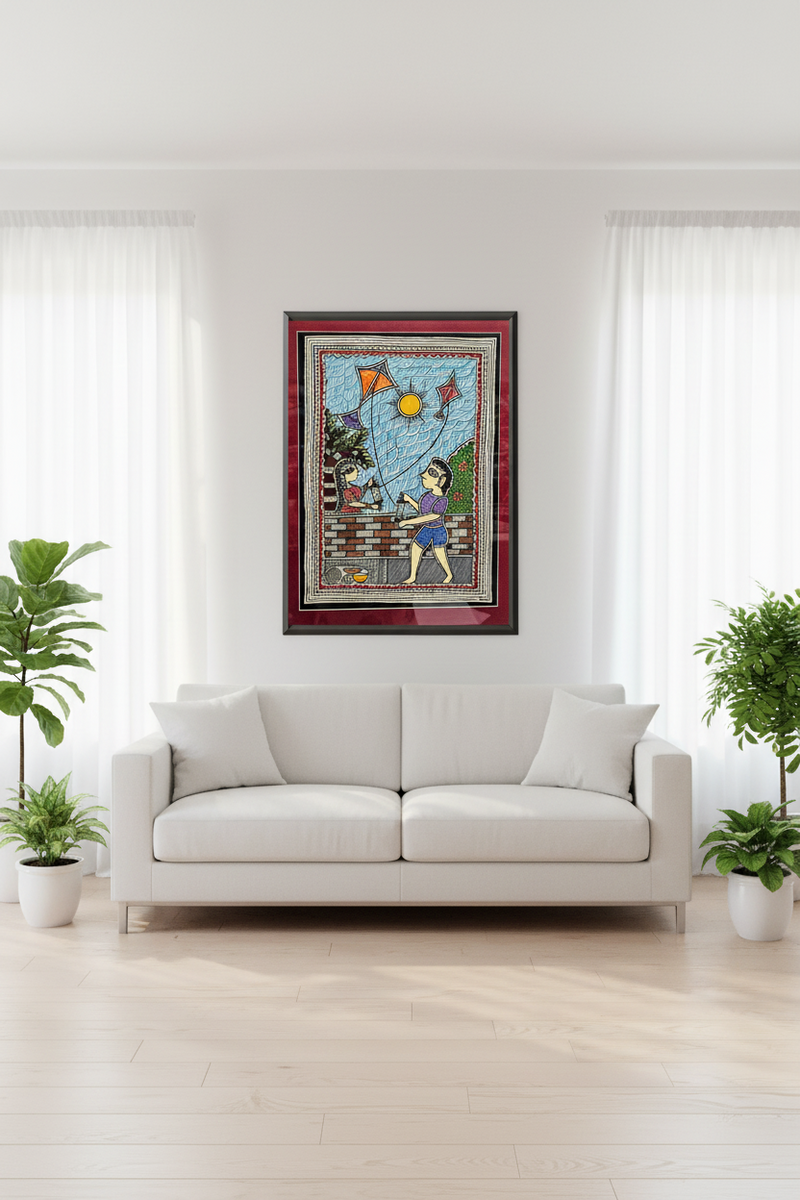 Framed artwork of a child flying kites on a wall above a white sofa in a bright room with plants.