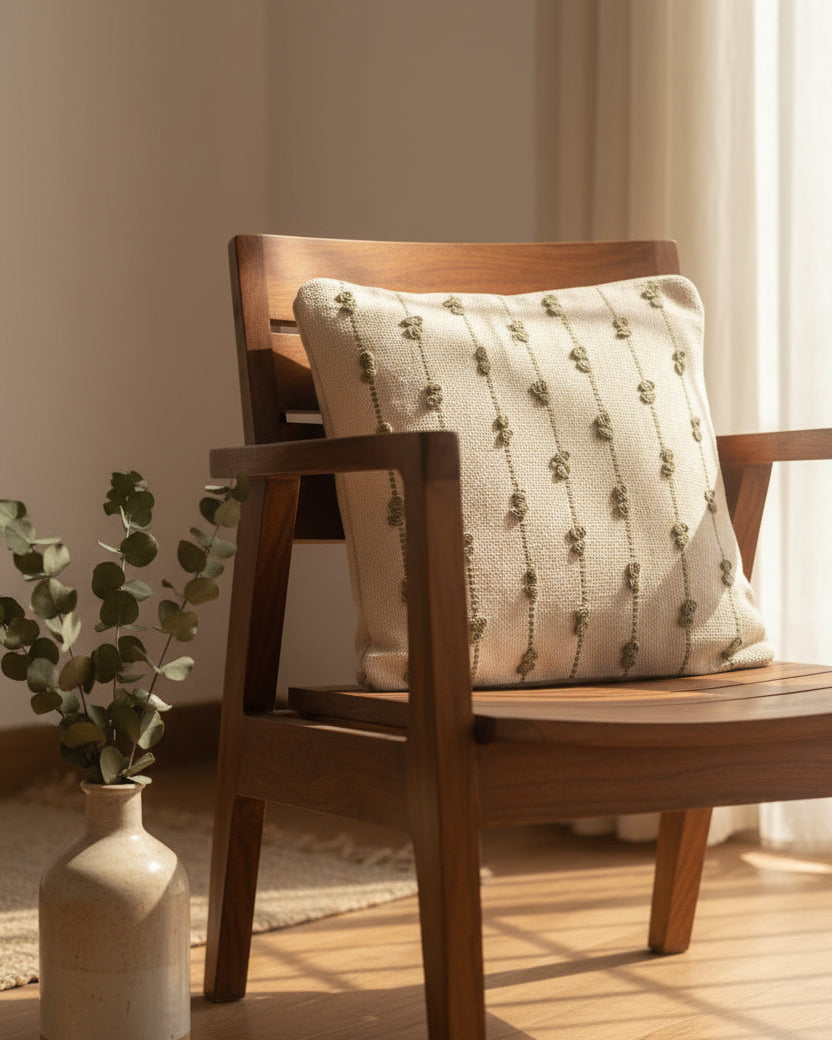 Set of 5 neutral boho-style cotton cushion covers, featuring three cream pillows with rows of grey tufted dots and two solid charcoal grey textured pillows, arranged neatly on a beige sofa in a cozy living room setting.
