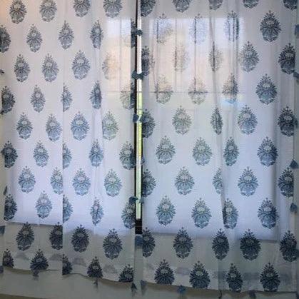 Sheer White Curtain With Blue Motifs And Grey Tassels
