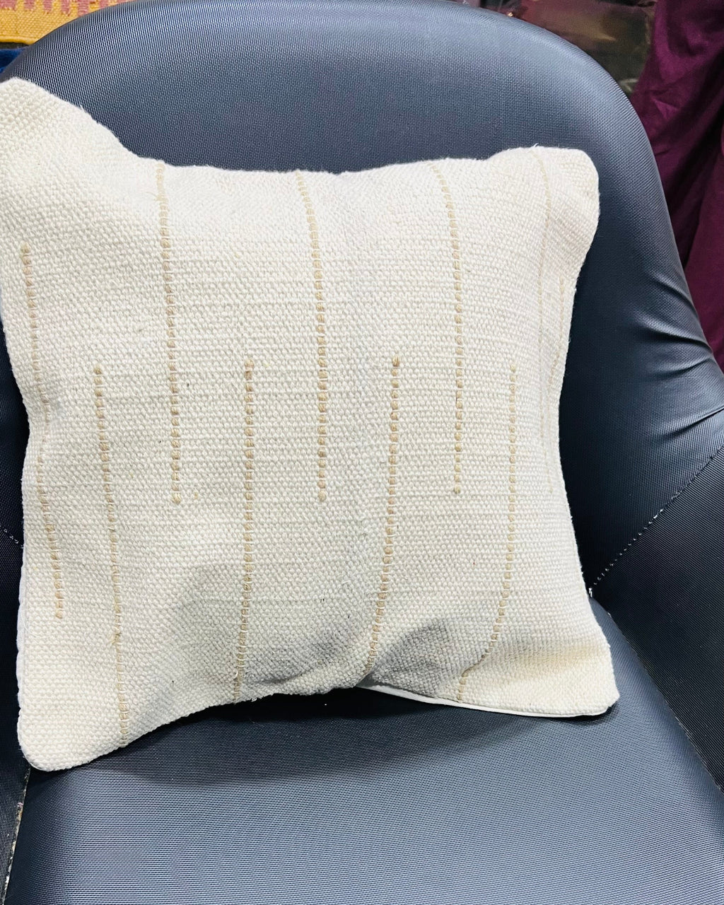 Vasaca boho off-white dotted line cotton throw pillow cover featuring subtle raised beige horizontal dot details and a hidden zipper on a natural cream cotton base.