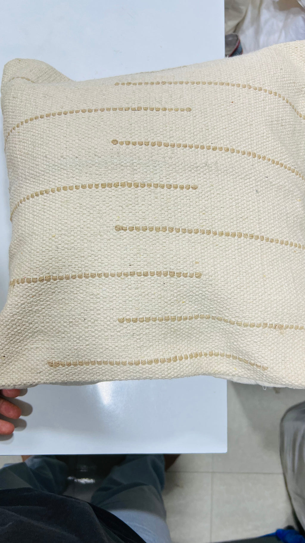 Vasaca boho off-white dotted line cotton throw pillow cover featuring subtle raised beige horizontal dot details and a hidden zipper on a natural cream cotton base.