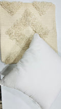 Vasaca boho off-white tufted cotton throw pillow cover featuring a tonal geometric diamond pattern, textured tufting details, and a hidden zipper on a natural cream cotton base.