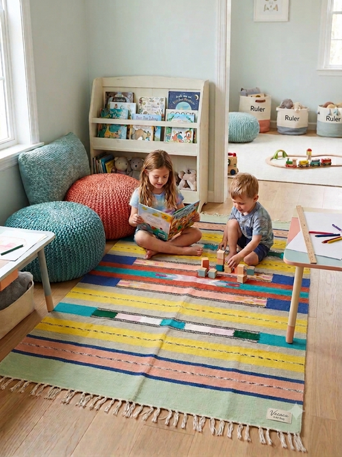Vasaca 100% handloom pure cotton 4x6 area rug featuring a vibrant multi-color Aztec geometric pattern with fringed tassels.