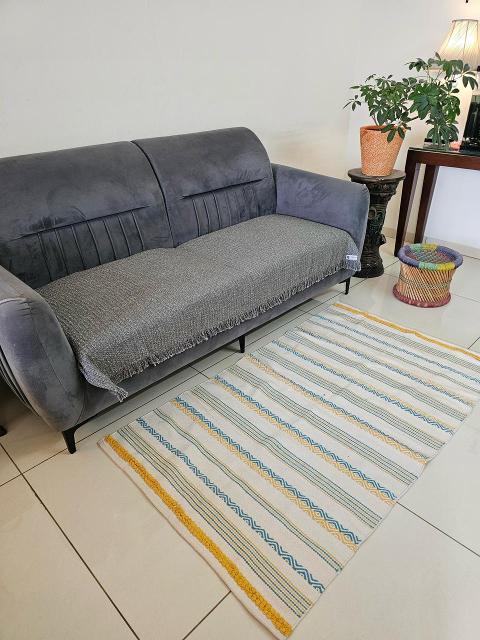 Handtufted Cotton Accent Rug | Off-White Floor Mat with Blue and Yellow Tufted Details