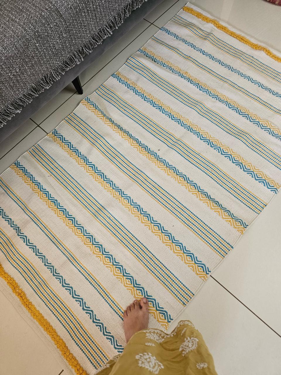 Handtufted Cotton Accent Rug | Off-White Floor Mat with Blue and Yellow Tufted Details