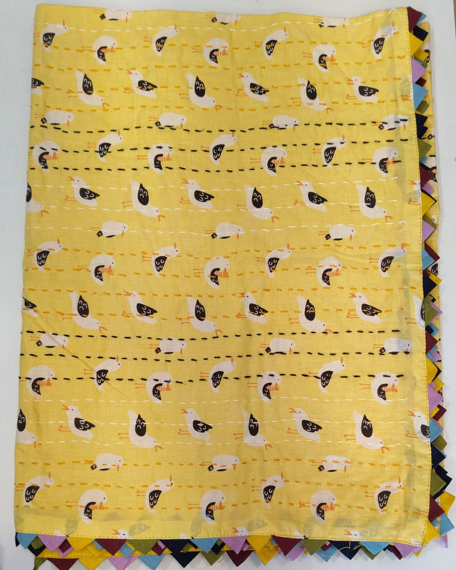 Yellow fabric with chicken pattern on a white background
