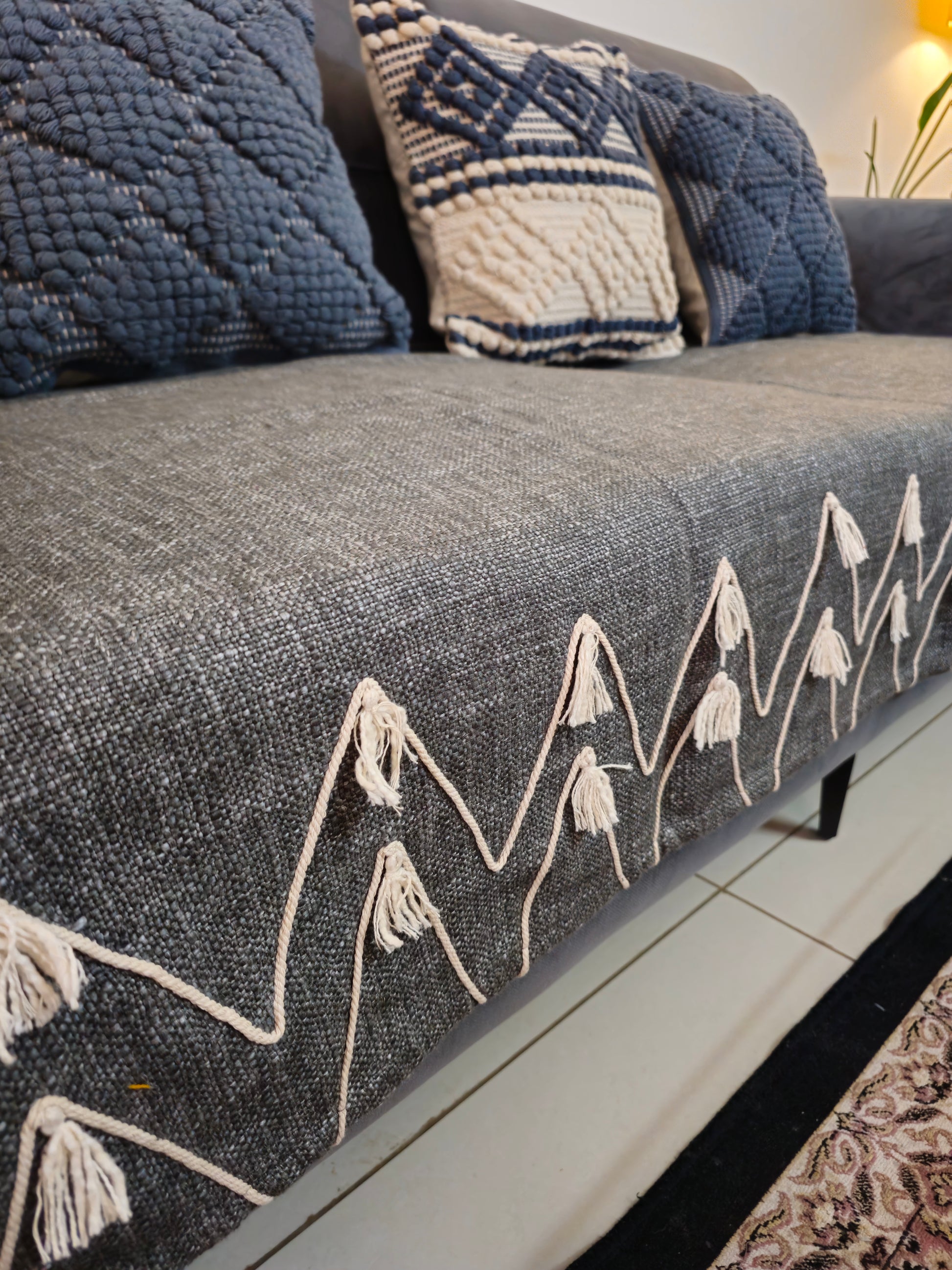 beige tassel sofa cover