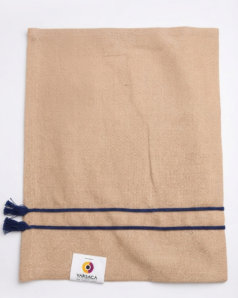 Natural textured burlap-style cotton placemat featuring navy blue horizontal stripes and side tassels.