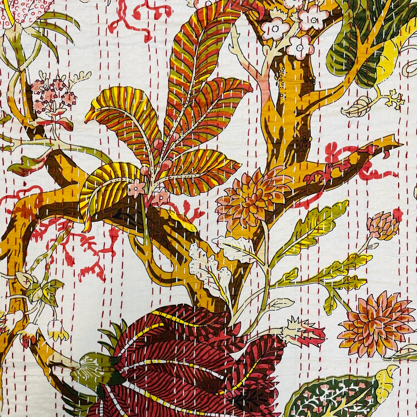 Close-up of a floral and leaf pattern with a textured background