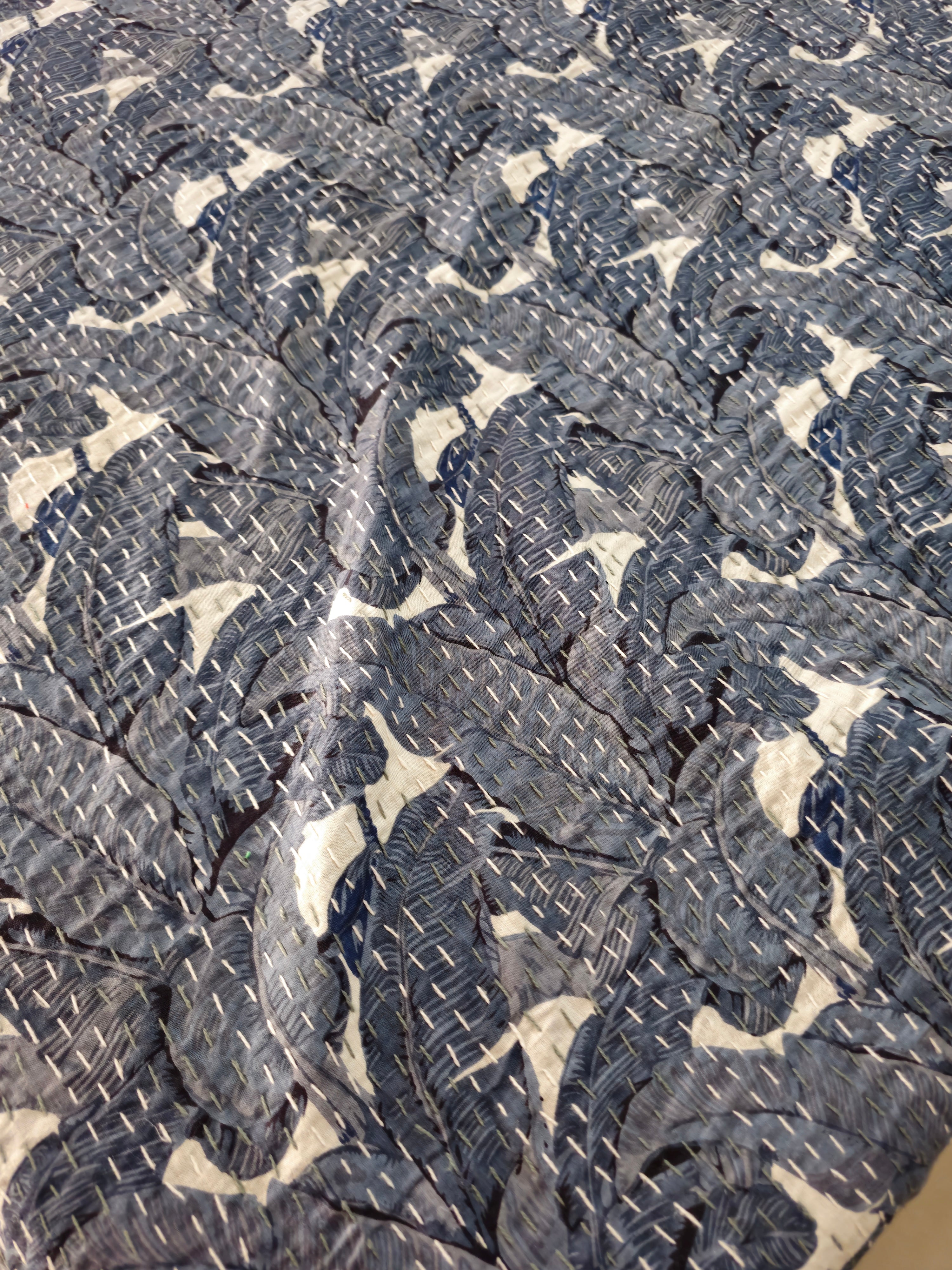 Close-up of textured grey and white fabric pattern