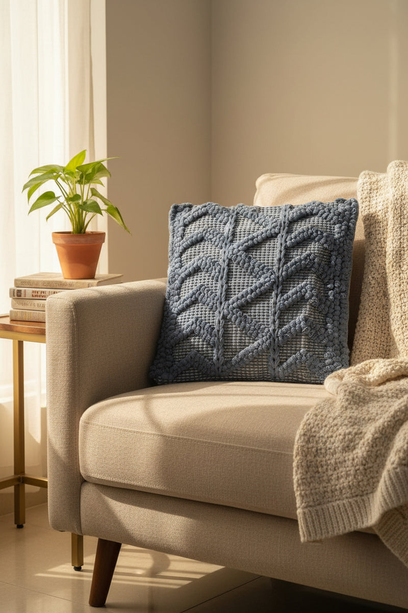 dark grey tufted cushion