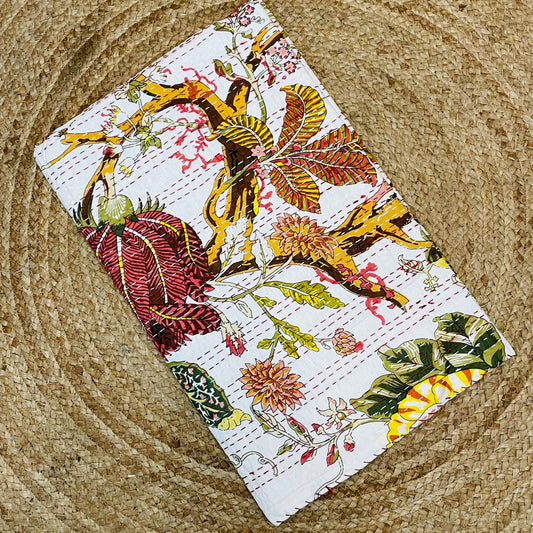 Fabric with floral and leaf pattern on a textured surface
