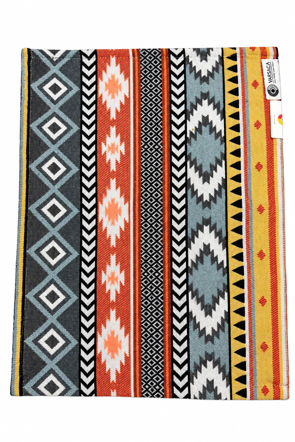 Geometric bohemian jacquard cotton placemat featuring a woven Aztec stripe and diamond pattern in rust orange, mustard, and slate gray.
