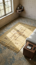 Golden Berber Handcrafted Pure Cotton Rug measuring 6x4 ft featuring tribal geometric motifs in charcoal and brown on warm beige flatweave cotton
