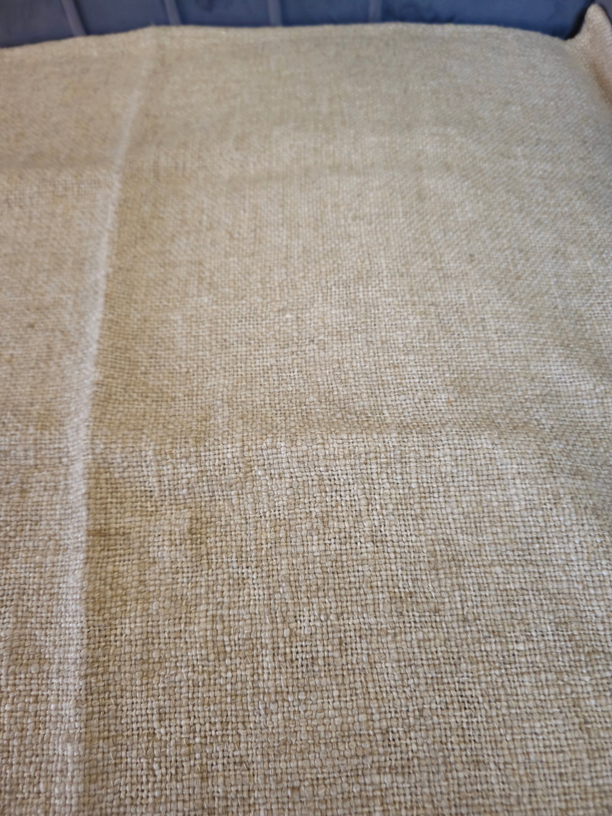 Textured fabric surface with a checkered pattern