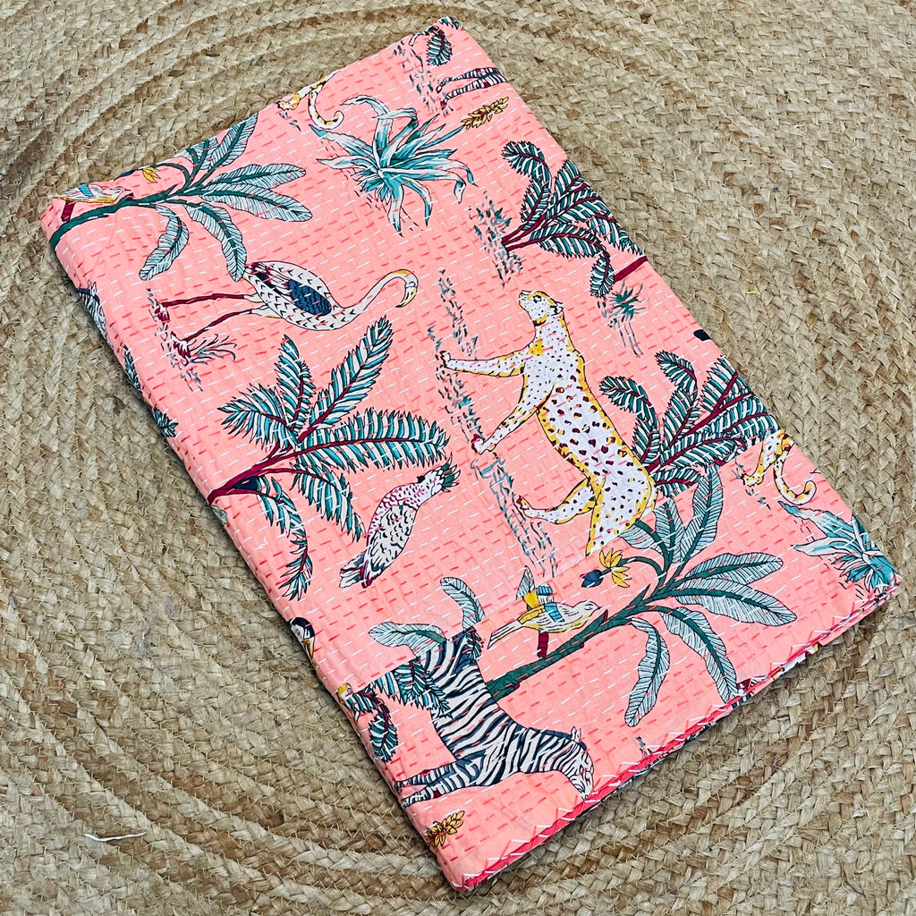 Floral and animal patterned fabric on a textured surface