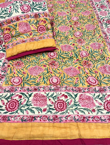 Floral patterned fabric with pink and yellow accents