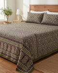 Olive green and deep plum cotton bed sheet featuring a traditional block-printed medallion and floral pattern with coordinating border details.