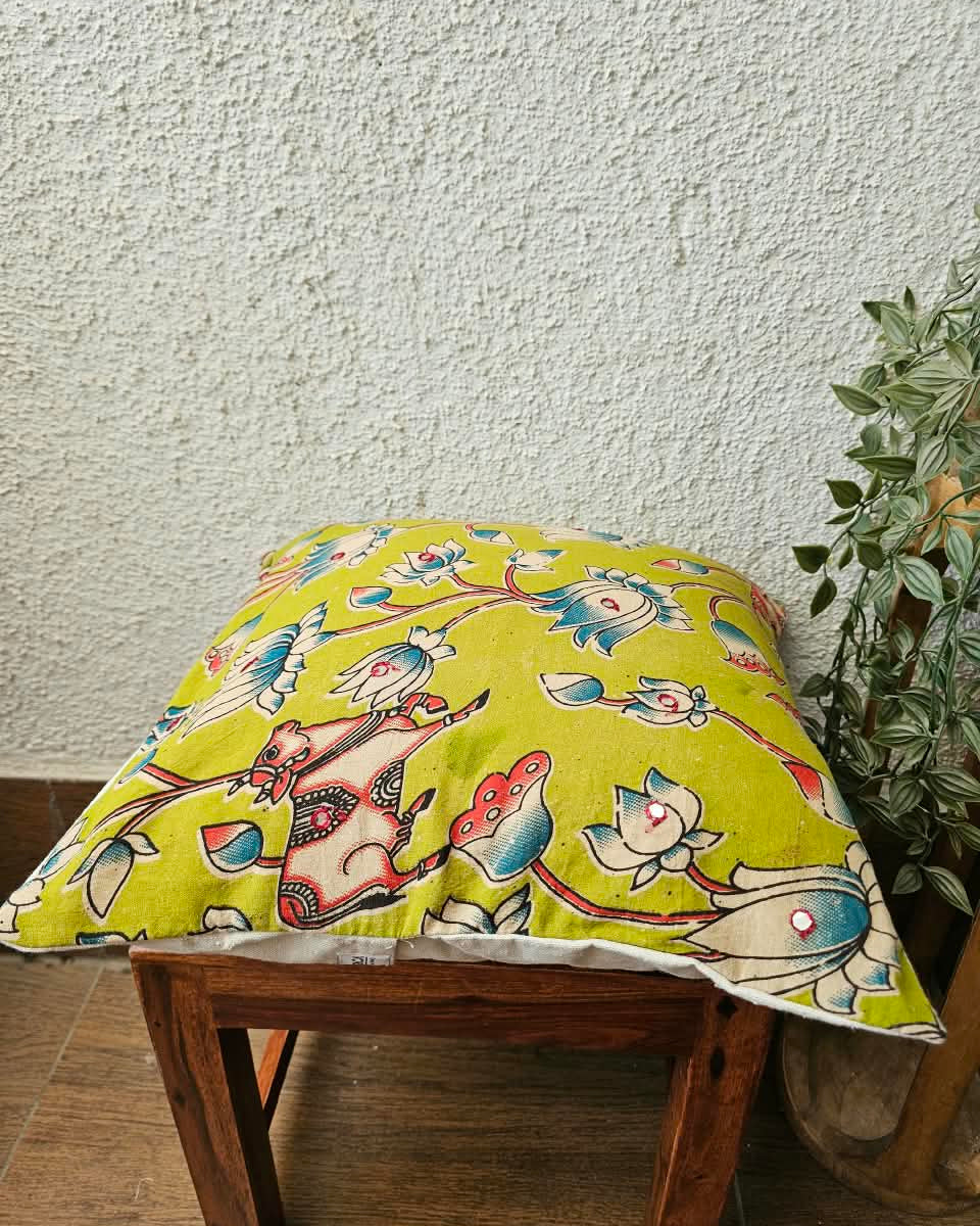 Olive lime green cotton cushion cover featuring traditional blue and white handblock lotus floral prints with subtle accent embellishments.