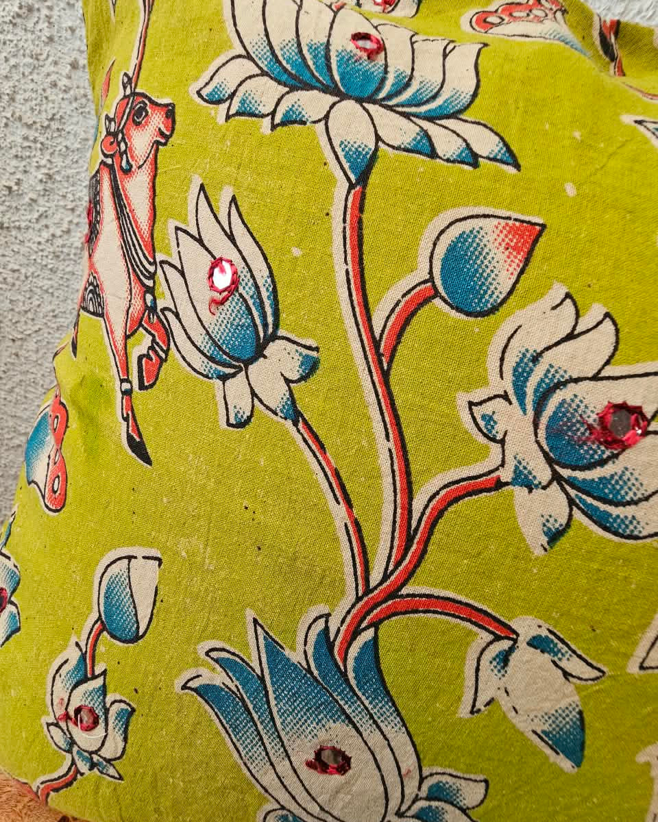 Olive lime green cotton cushion cover featuring traditional blue and white handblock lotus floral prints with subtle accent embellishments.