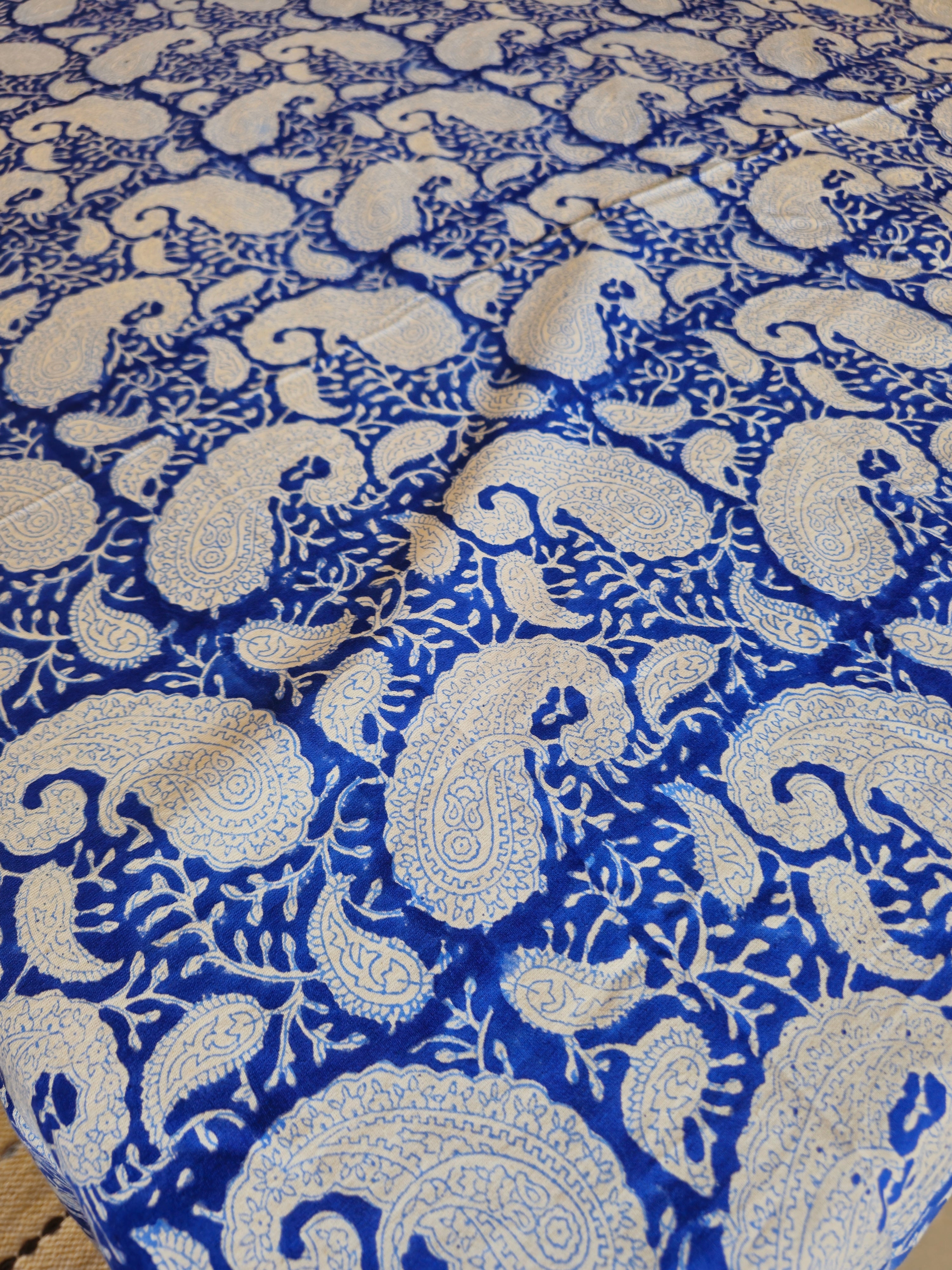Blue and white paisley patterned fabric