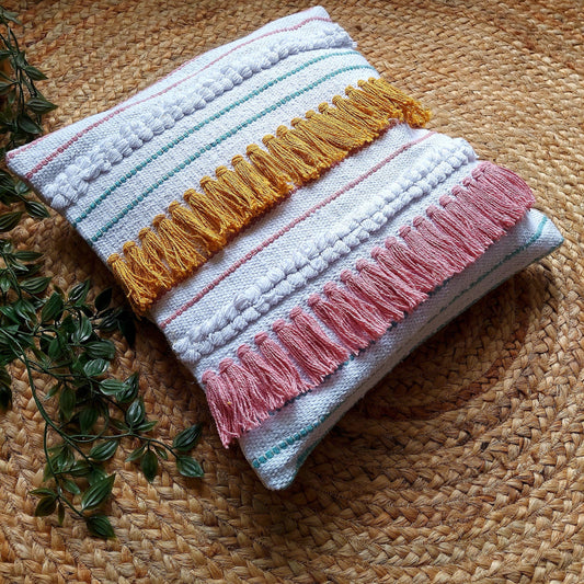 pink and mustard tassel cushion