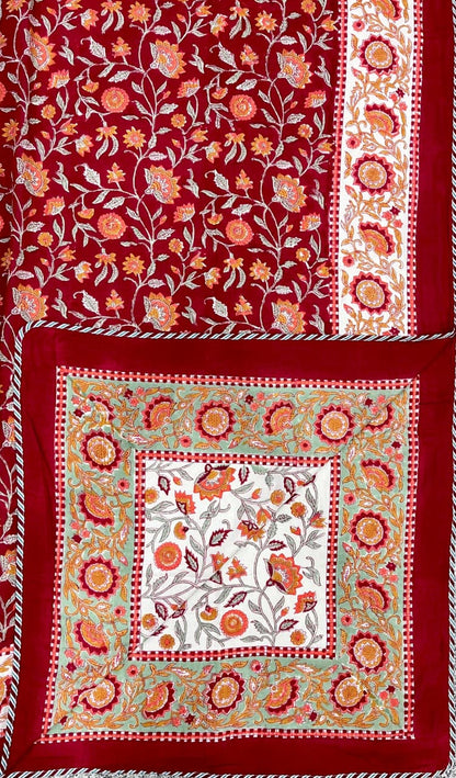 Decorative fabric with floral patterns on a red background