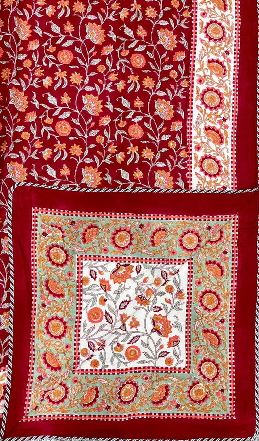 Decorative fabric with floral patterns on a red background