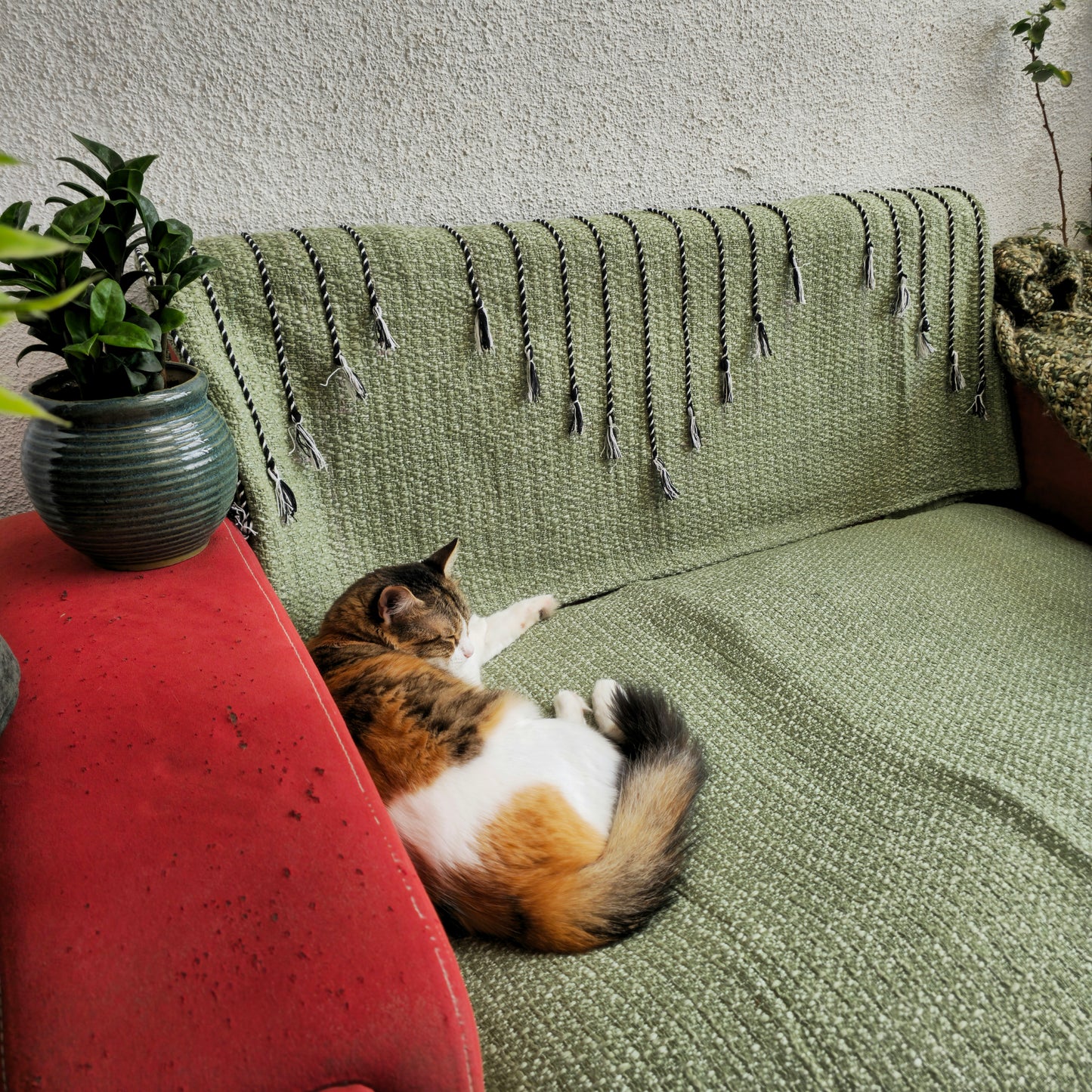 Green Handwoven Sofa Cover with Black Thread Embroidery & Tassels