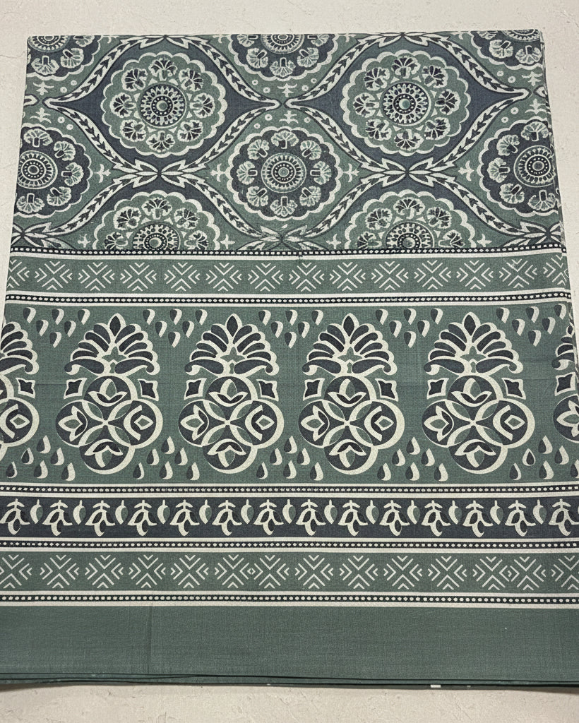 Sage green and charcoal cotton bed sheet featuring a traditional block-printed medallion and floral pattern with coordinating border details.