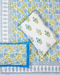 100x108 inch king size cotton bedsheet and matching blue-bordered pillow covers styled with a traditional sky blue and green floral vine handblock print.