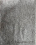 Rectangular solid neutral textured cotton cushion cover in a versatile grey-taupe shade, laid flat on a light surface.