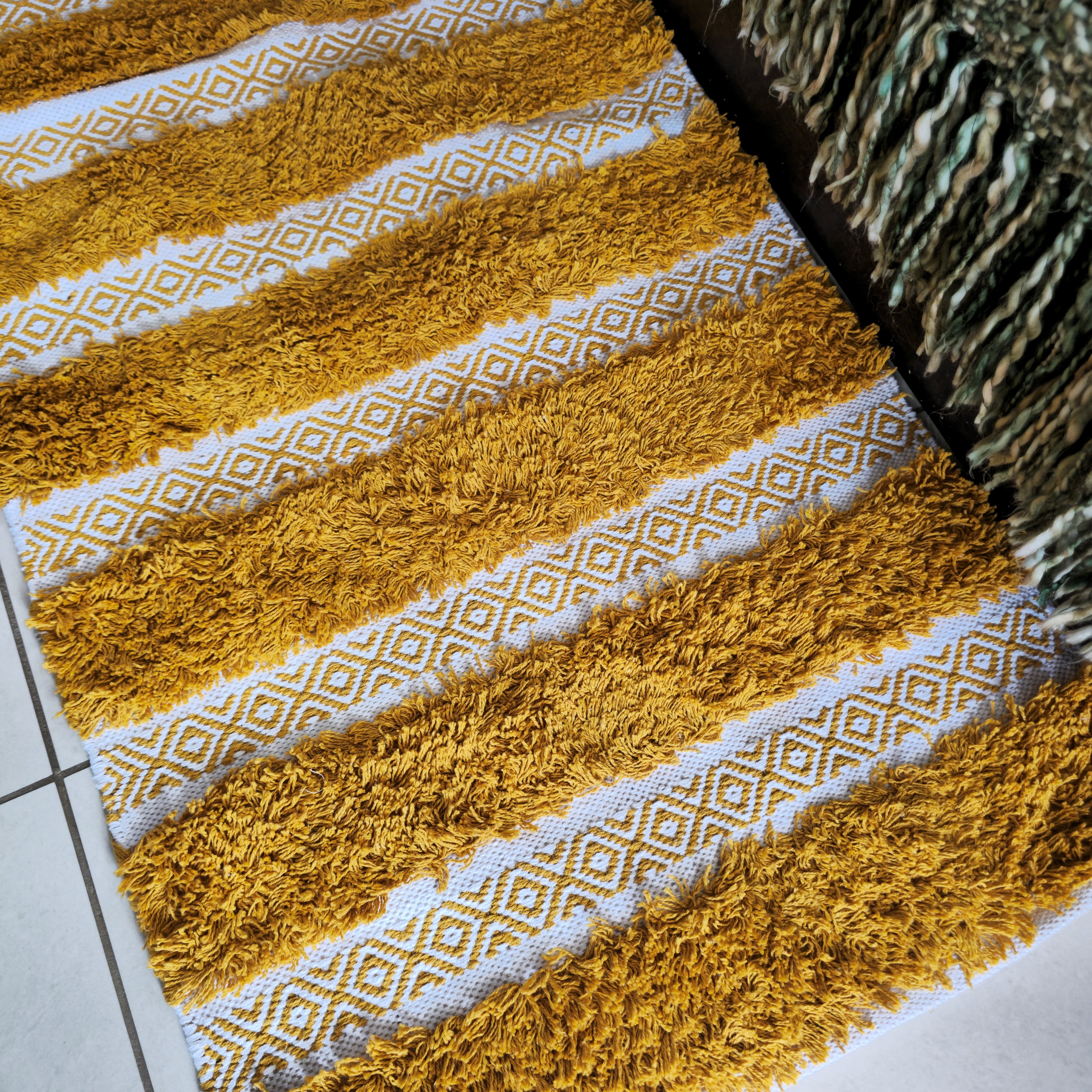 Sunburst Tufted Stripe Pure Cotton Rug with vibrant mustard yellow tufted stripes and off-white geometric diamond lattice flatweave base