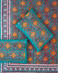 100x108 inch king size cotton bedsheet and matching pillow covers styled with a traditional teal, orange, and pink medallion handblock print.
