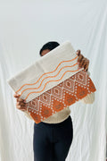 Terracotta Ikat Jacquard Jute Cotton Laptop Sleeve featuring a rust orange diamond geometric pattern and off-white jute panel with orange hand-stitched wave embroidery